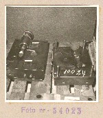 54023